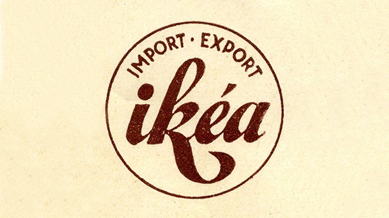 Stämplat på gulnat papper är text i en cirkel, IMPORT EXPORT ovanför ikéa i ett fetat kursivt typsnitt.