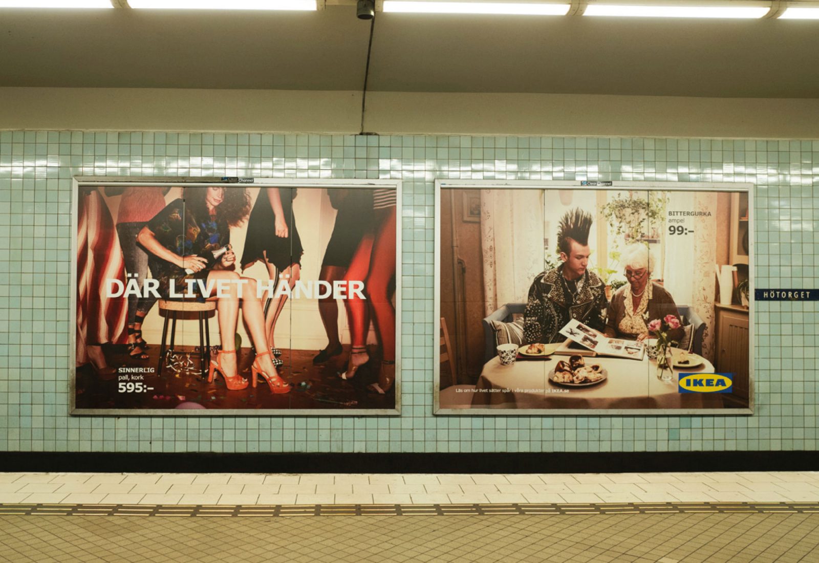 Big posters on tube station wall with photos from a club and a coffee break, with IKEA logo and text 