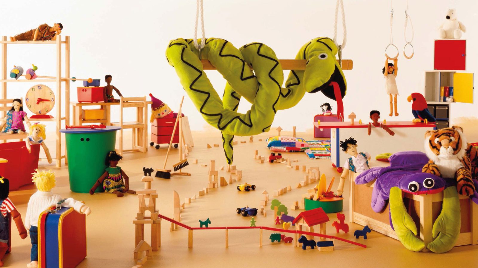 Colourful children's products like soft toys, shelves, blocks, and more.