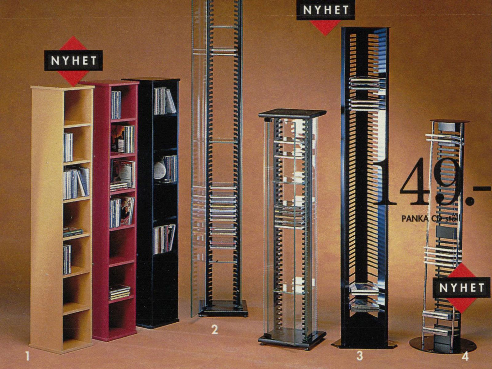 CD shelves and towers in different models, made of wood, plastic, and/or metal, standing in a long row.