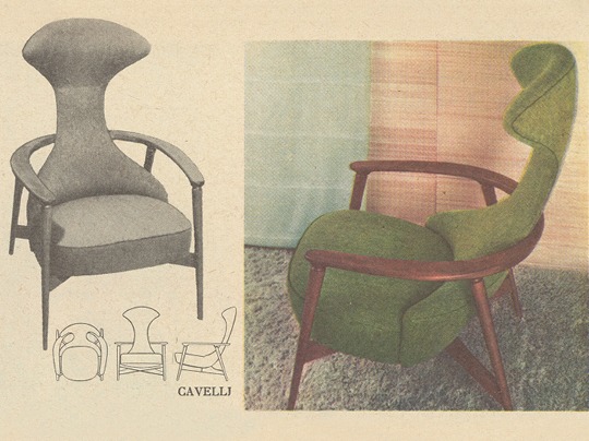 1950s armchair with green upholstery and a high back.