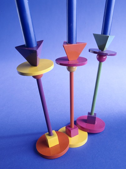 1990s-style candlesticks made of wood in different shapes and bold colours.