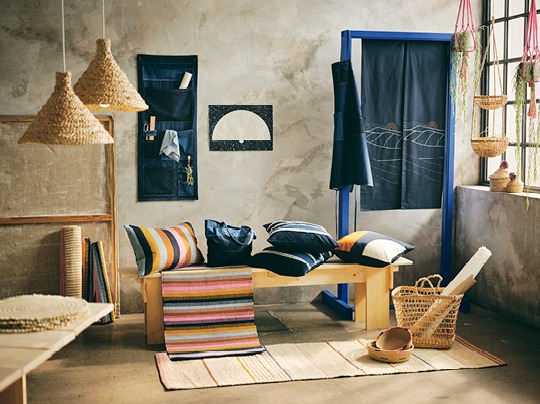 Large room with furniture and other products made of natural materials.