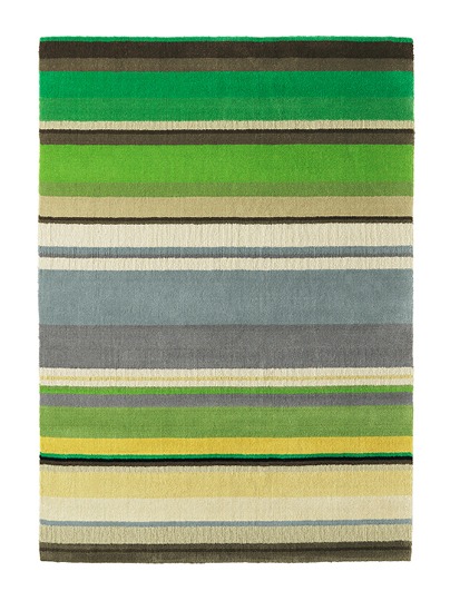 Striped rug in green, black, white and grey colours.