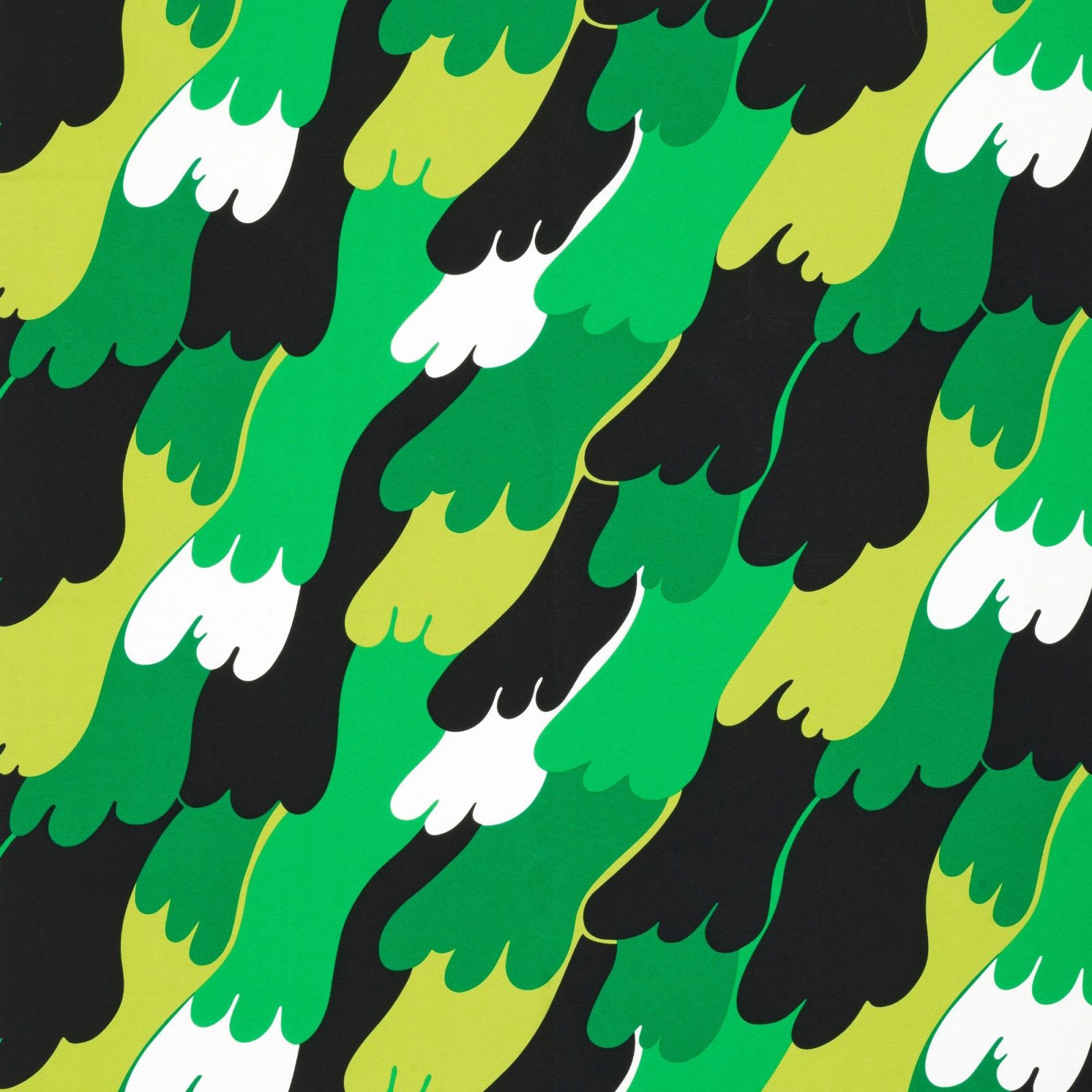 Mönster av stora tassar i grönt, vitt och svart.