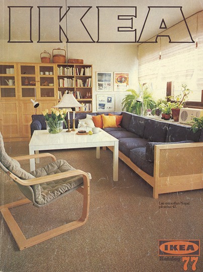 Cover of the 1977 IKEA catalogue with blond wood armchair in foreground of simple living room.