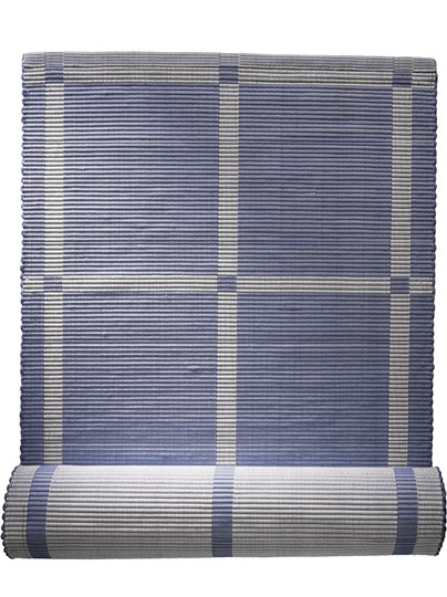 Rug in blue and grey-white big squares, half rolled up, ANHOLT.
