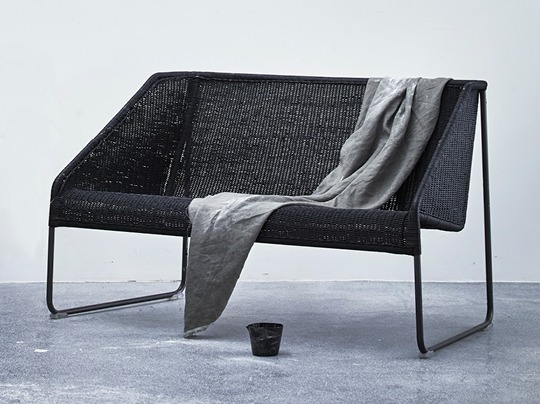 Simple black sofa with straight lines, woven seat and metal frame, from the VIKTIGT collection.