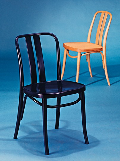 Two LENA bentwood chairs, one black, one lacquered wood.